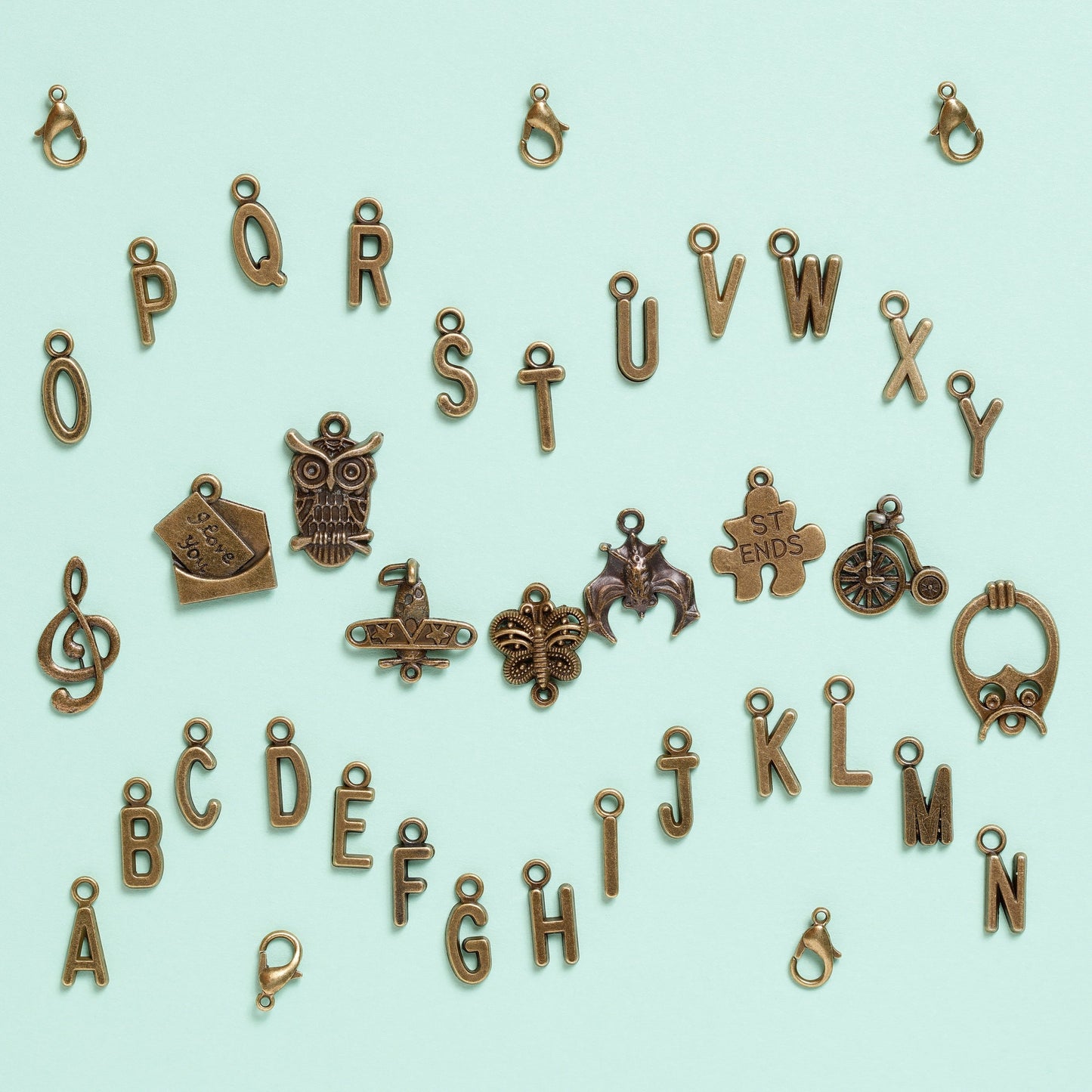 Image of Assorted Bronze Charms Close-up | Caption-Assorted Bronze Charms Close-up