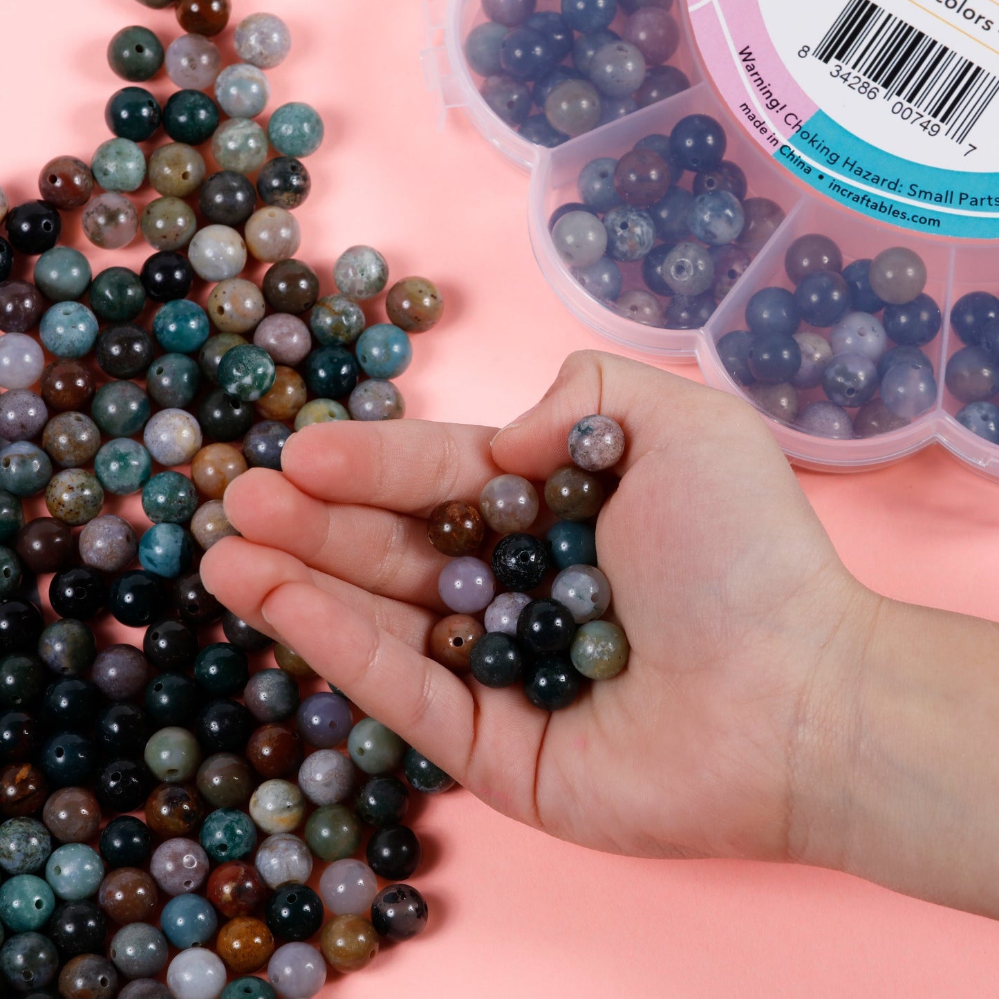 Image of Bulk Indian Agate Beads in Hand Display | Caption-Bulk Indian Agate Beads in Hand Display