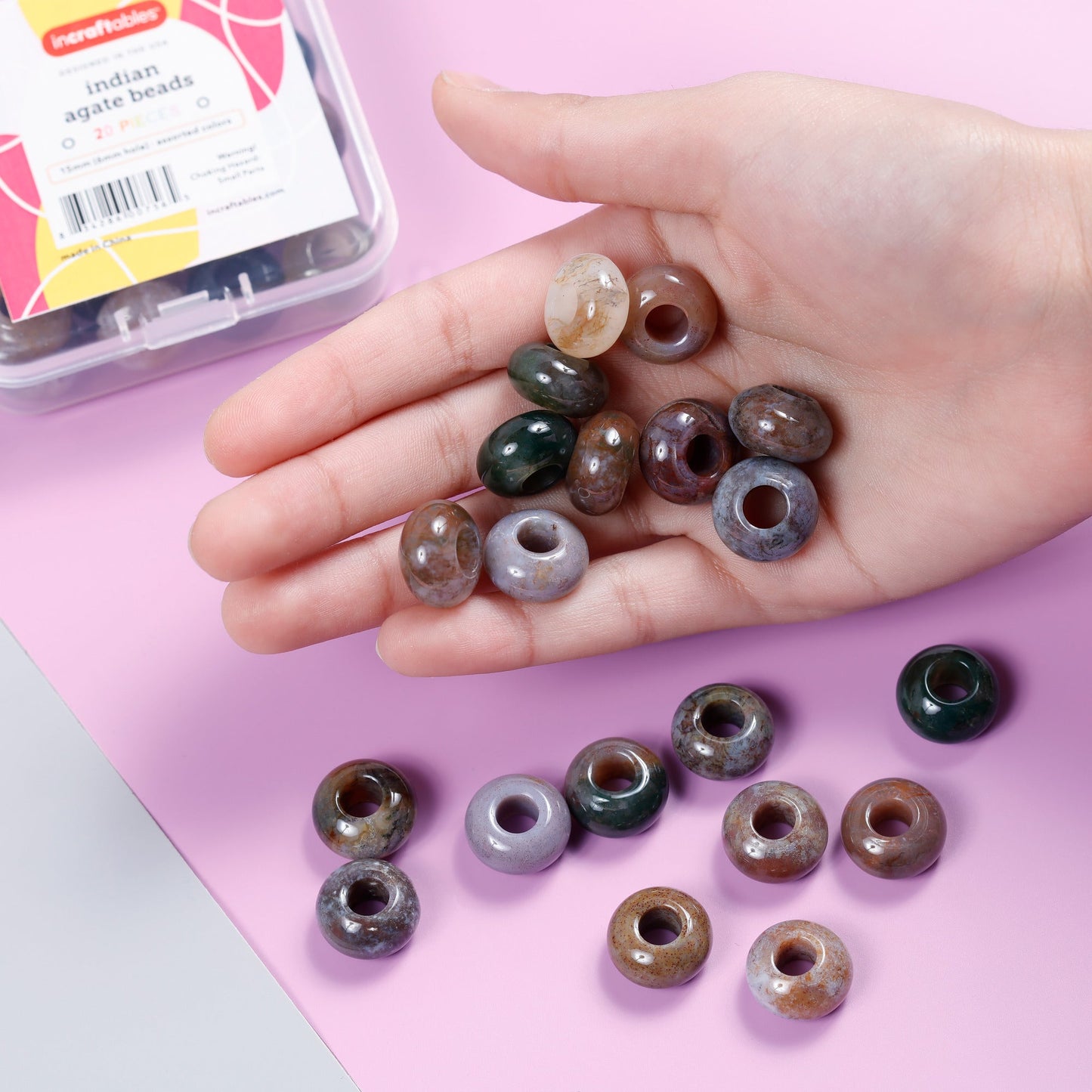 Image of Bulk Indian Agate Beads in Hand Display | Caption-Bulk Indian Agate Beads in Hand Display