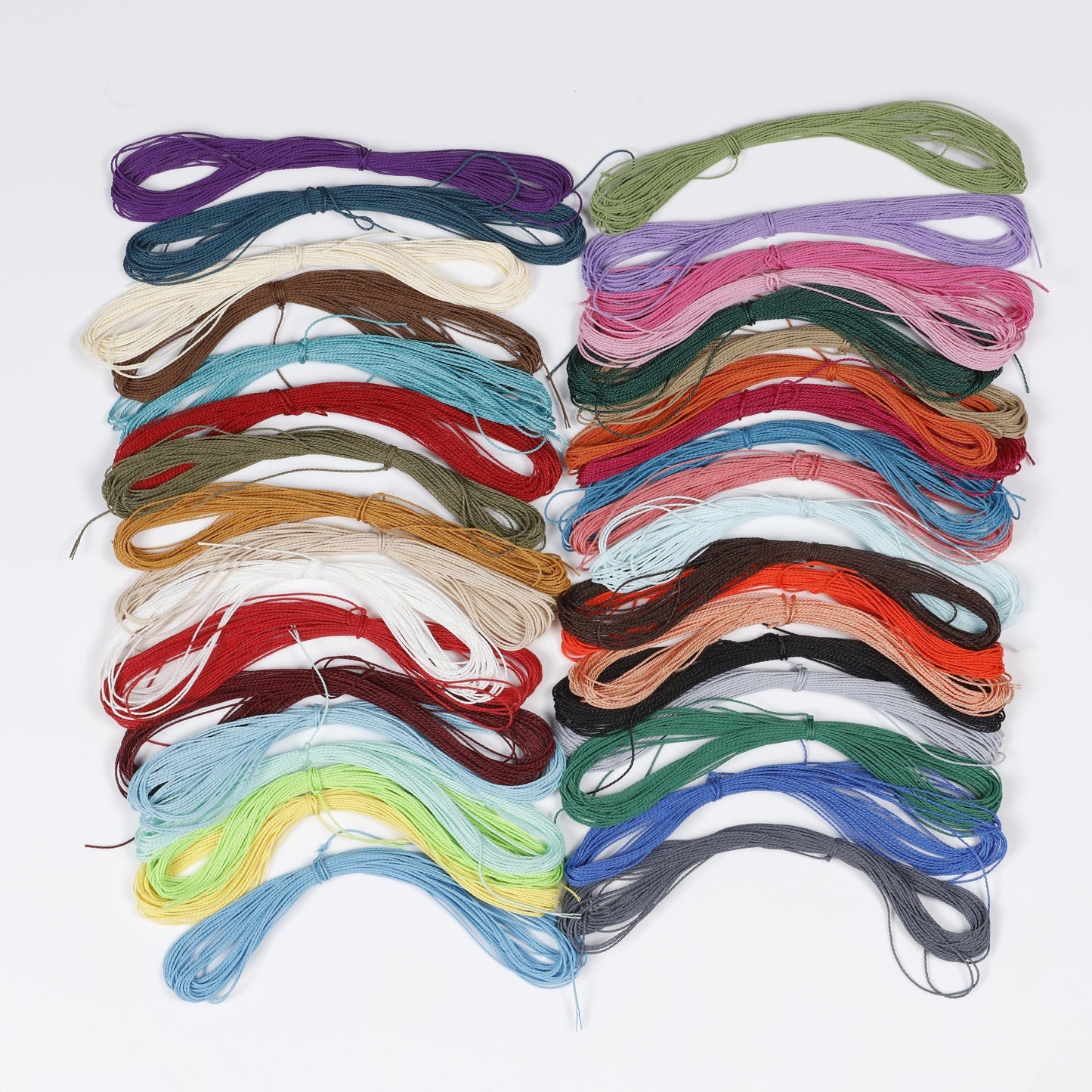 Image of Bulk Waxed Polyester Cord Close-up Display | Caption-Bulk Waxed Polyester Cord Close-up Display
