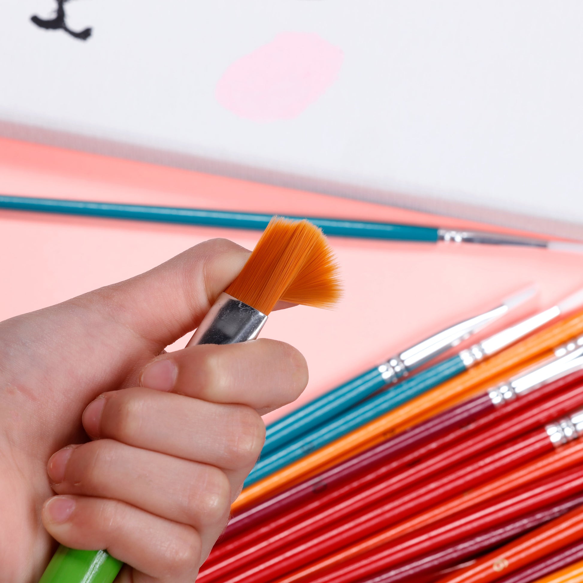 Image of Using Assorted Paint Brushes for Craft Projects