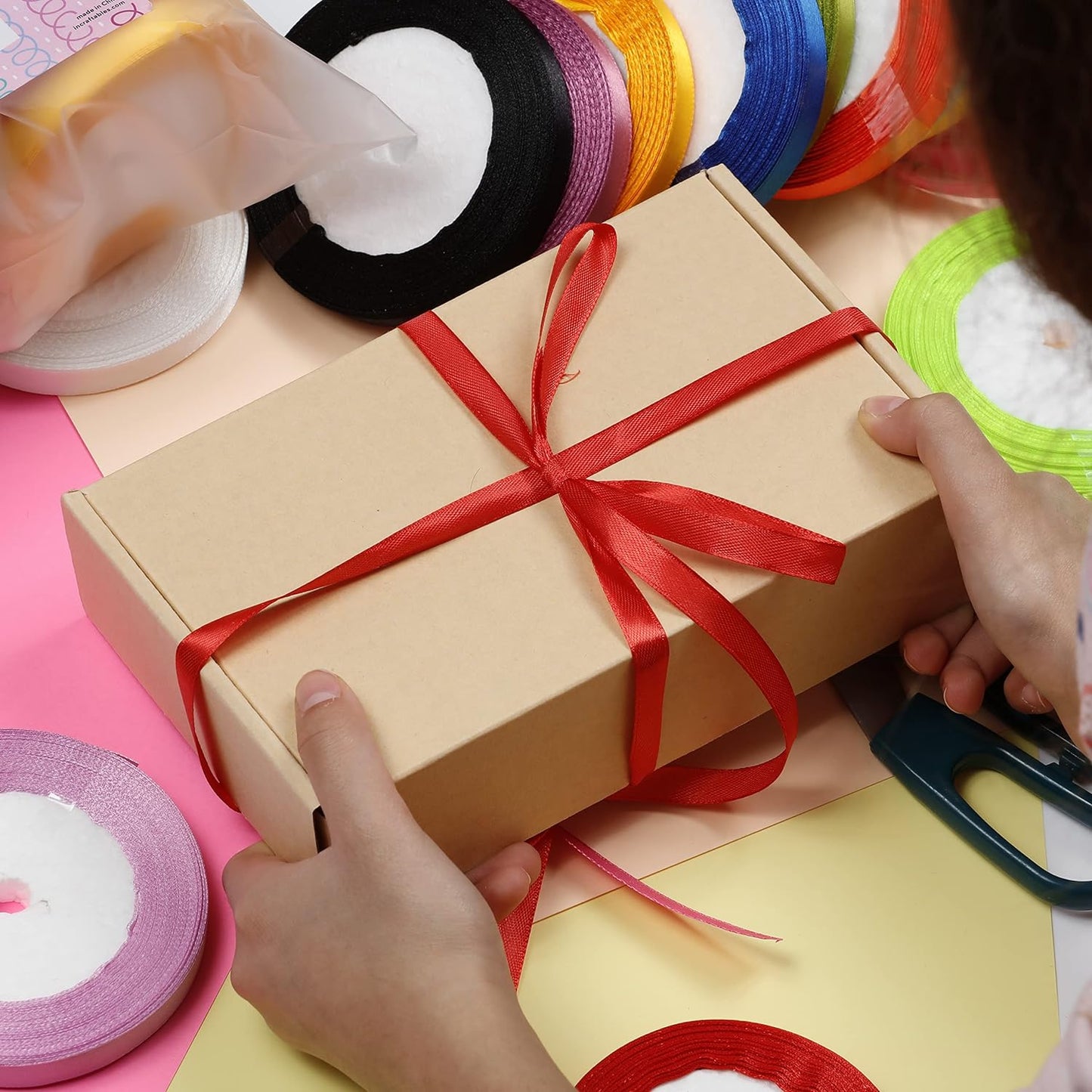 Image of Using Ribbon for Gift Wrapping Close-up | Caption-Using Ribbon for Gift Wrapping Close-up
